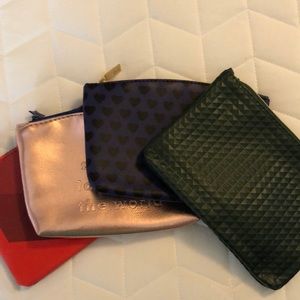 A 4 pack of small Etsy makeup bags